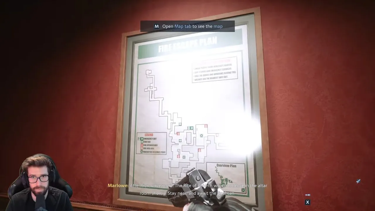 Scarlet Church floor plan on the wall with the prompt to open the map tab